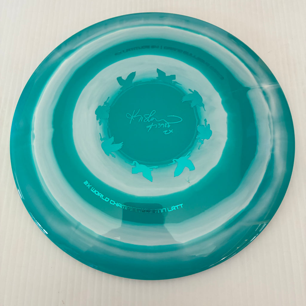 Latitude 64° 2025 Kristin Lätt Team Series Royal Grand Bullseye Grace 11/6/-1/2