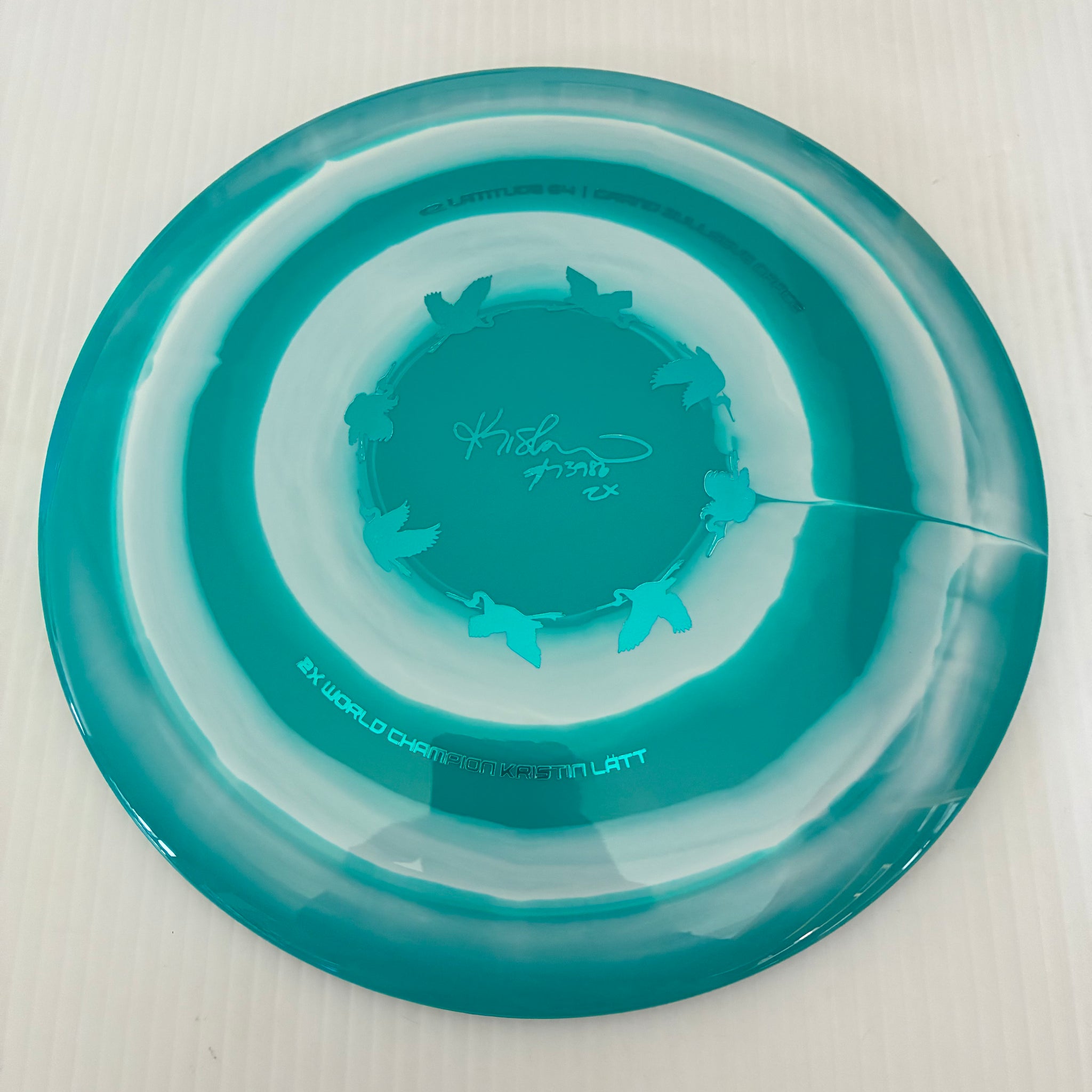 Latitude 64° 2025 Kristin Lätt Team Series Royal Grand Bullseye Grace 11/6/-1/2