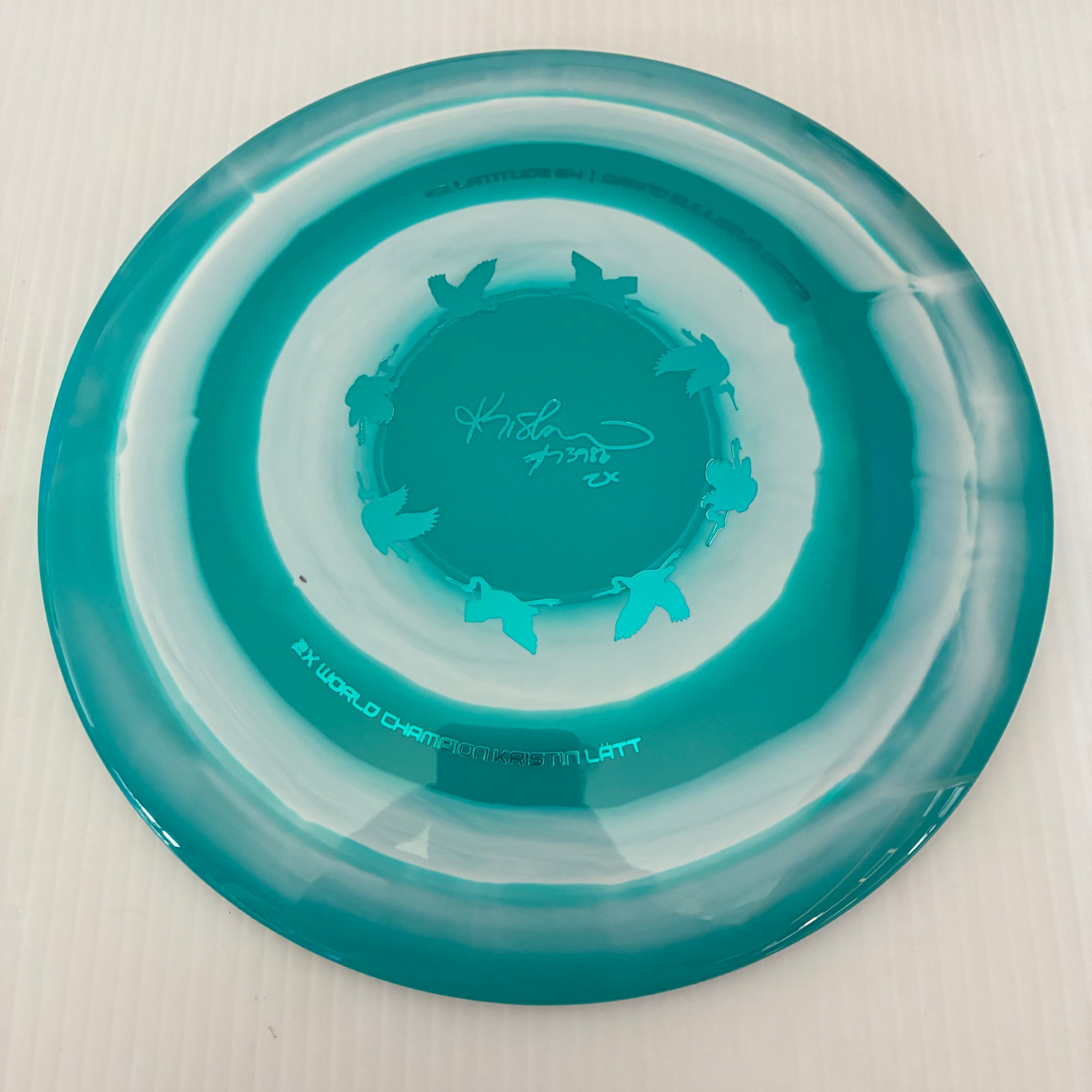 Latitude 64° 2025 Kristin Lätt Team Series Royal Grand Bullseye Grace 11/6/-1/2