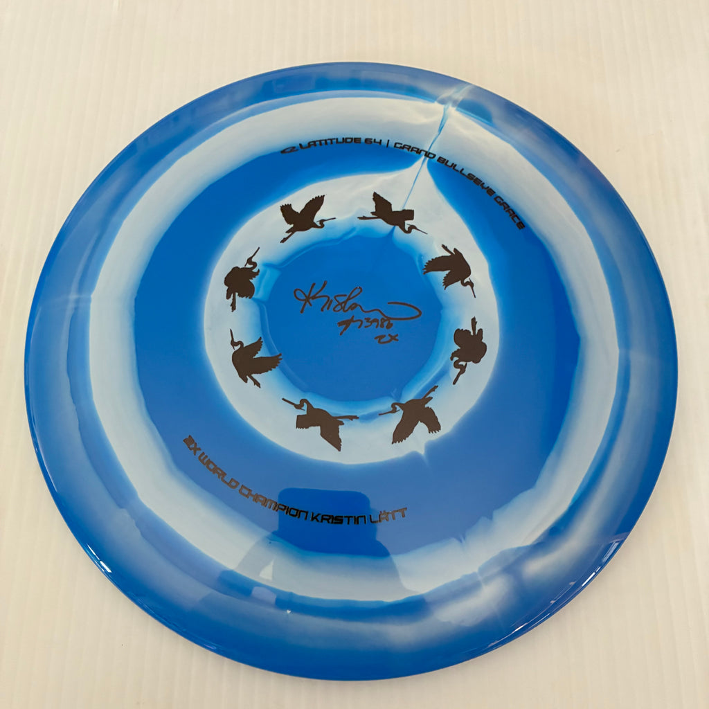 Latitude 64° 2025 Kristin Lätt Team Series Royal Grand Bullseye Grace 11/6/-1/2