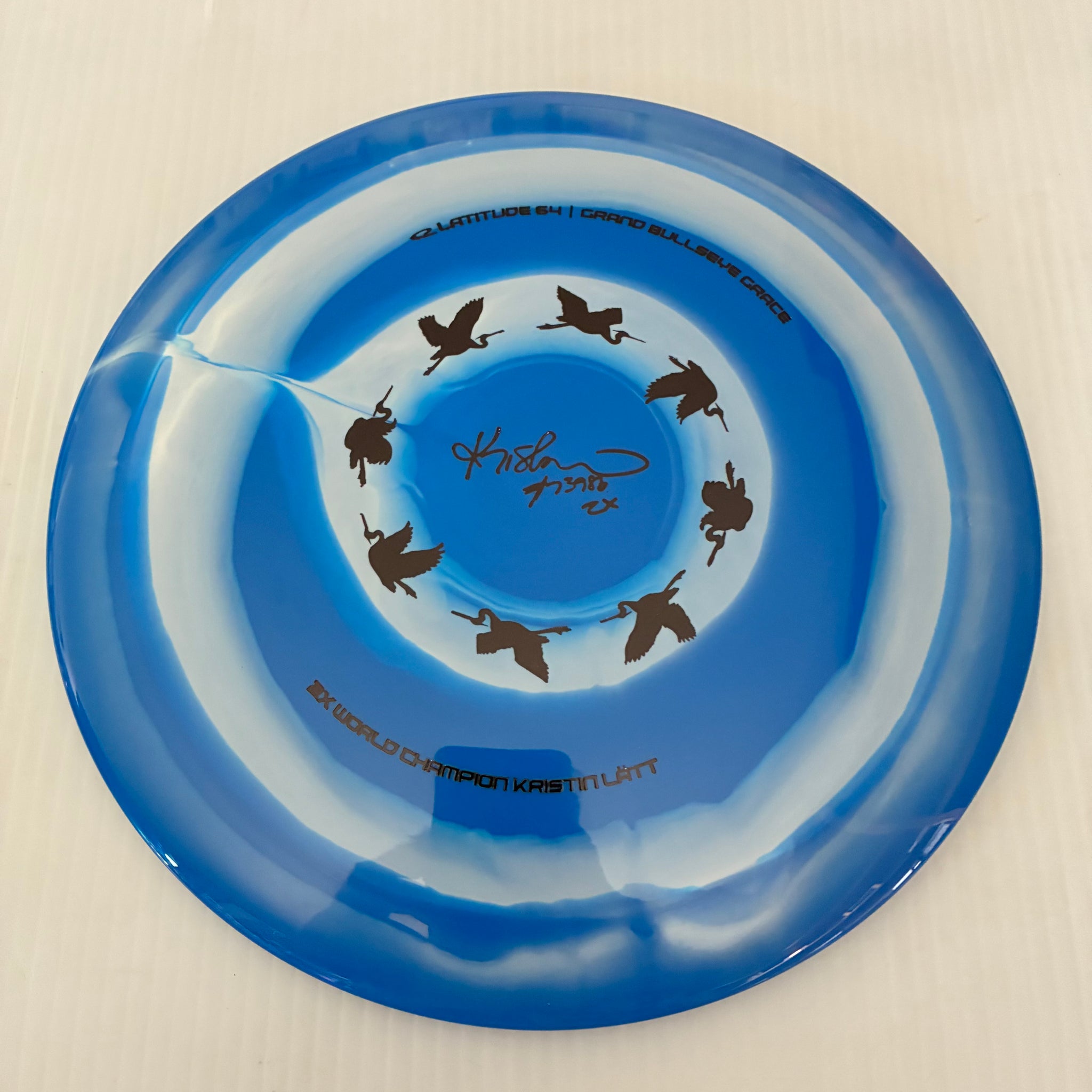 Latitude 64° 2025 Kristin Lätt Team Series Royal Grand Bullseye Grace 11/6/-1/2