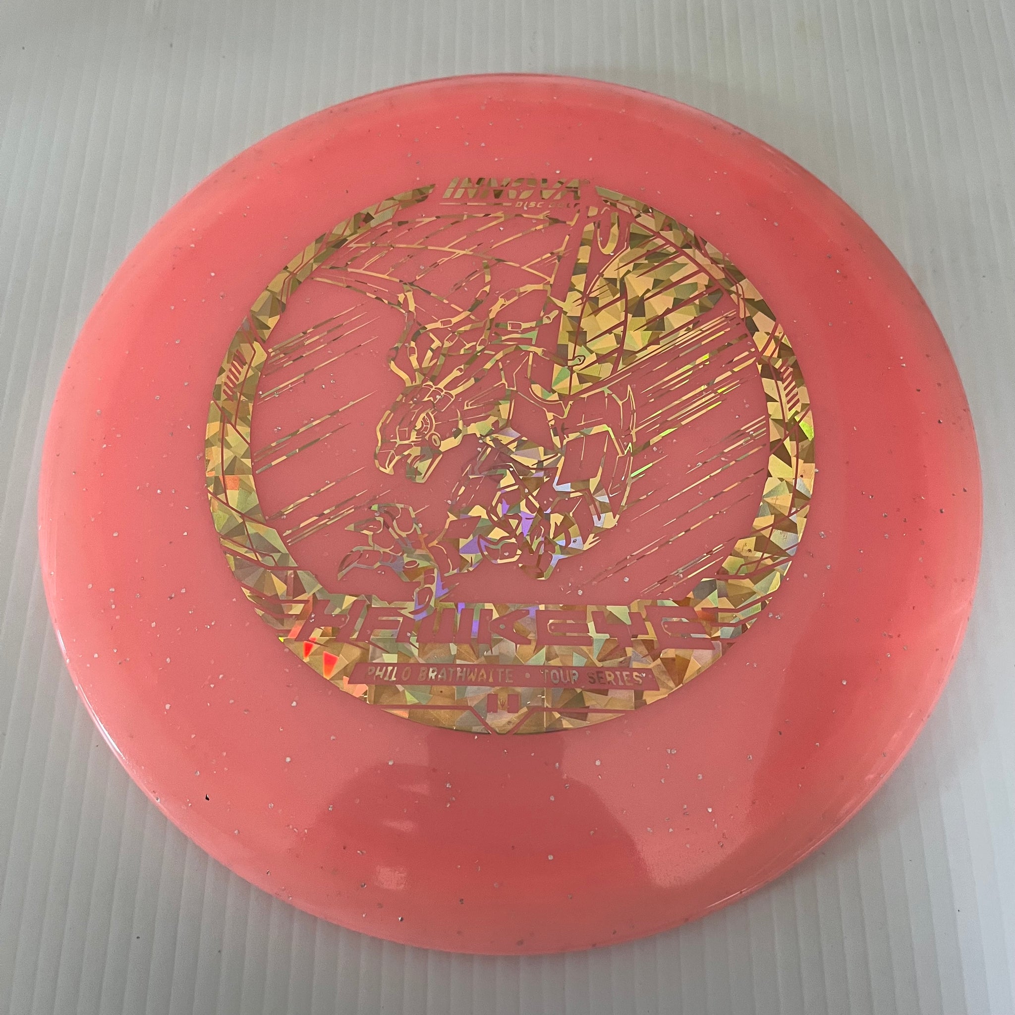 Innova 2023 Philo Brathwaite Tour Series Metal Flake Champion Glow Hawkeye 7/5/-1/1