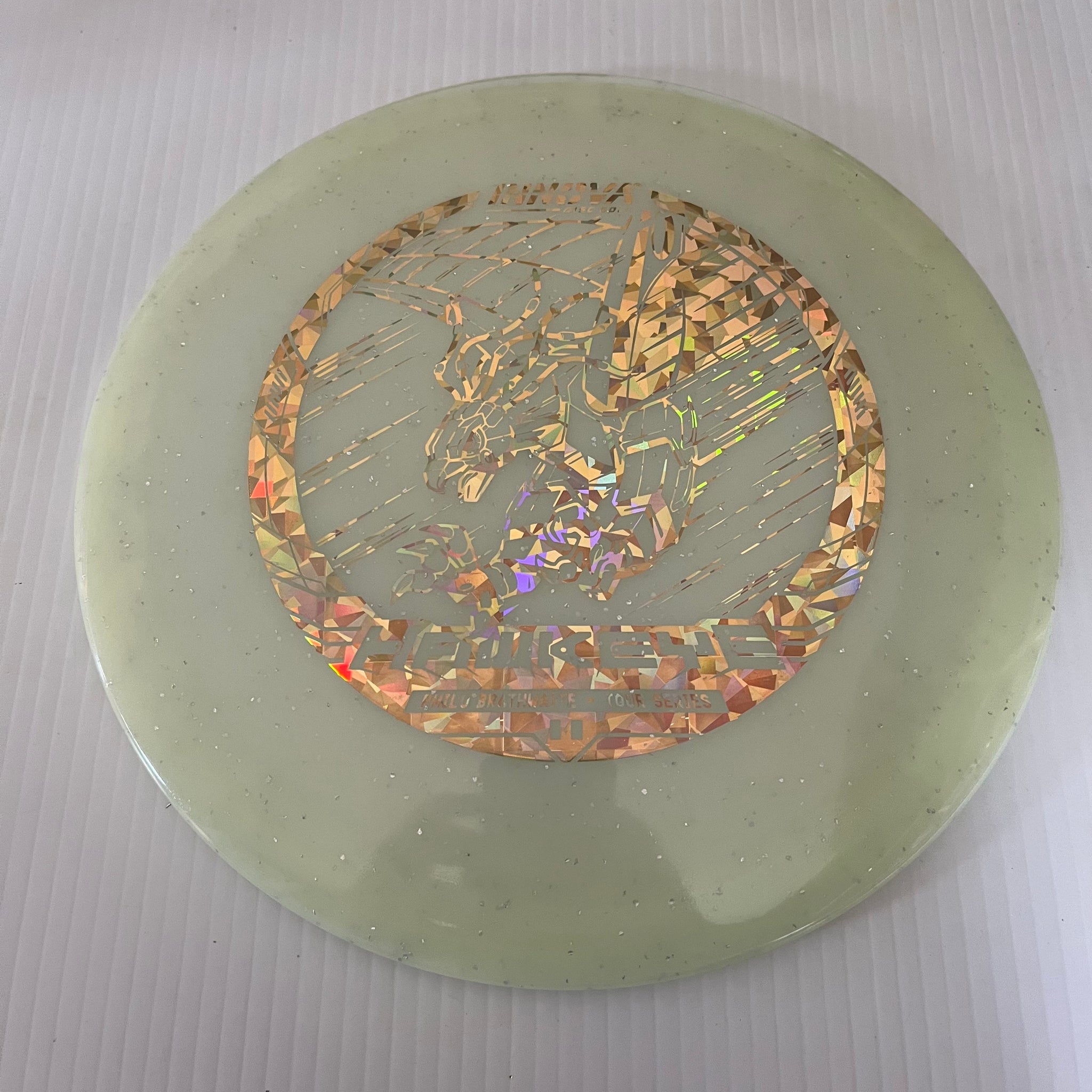 Innova 2023 Philo Brathwaite Tour Series Metal Flake Champion Glow Hawkeye 7/5/-1/1