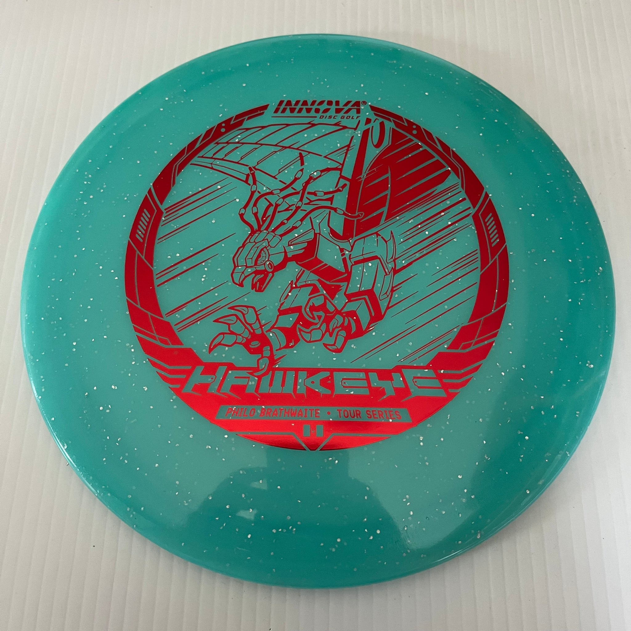 Innova 2023 Philo Brathwaite Tour Series Metal Flake Champion Glow Hawkeye 7/5/-1/1