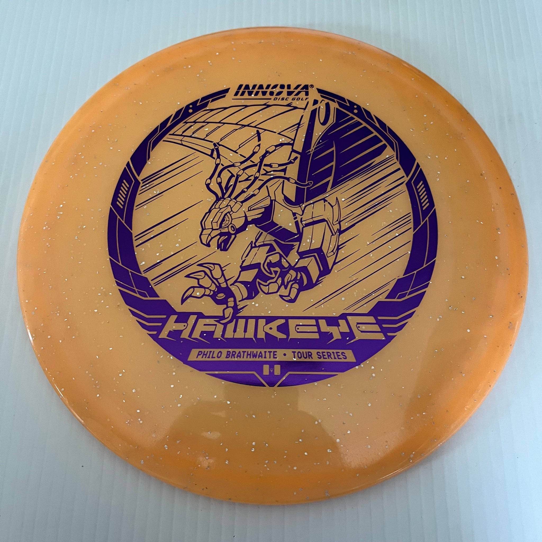 Innova 2023 Philo Brathwaite Tour Series Metal Flake Champion Glow Hawkeye 7/5/-1/1