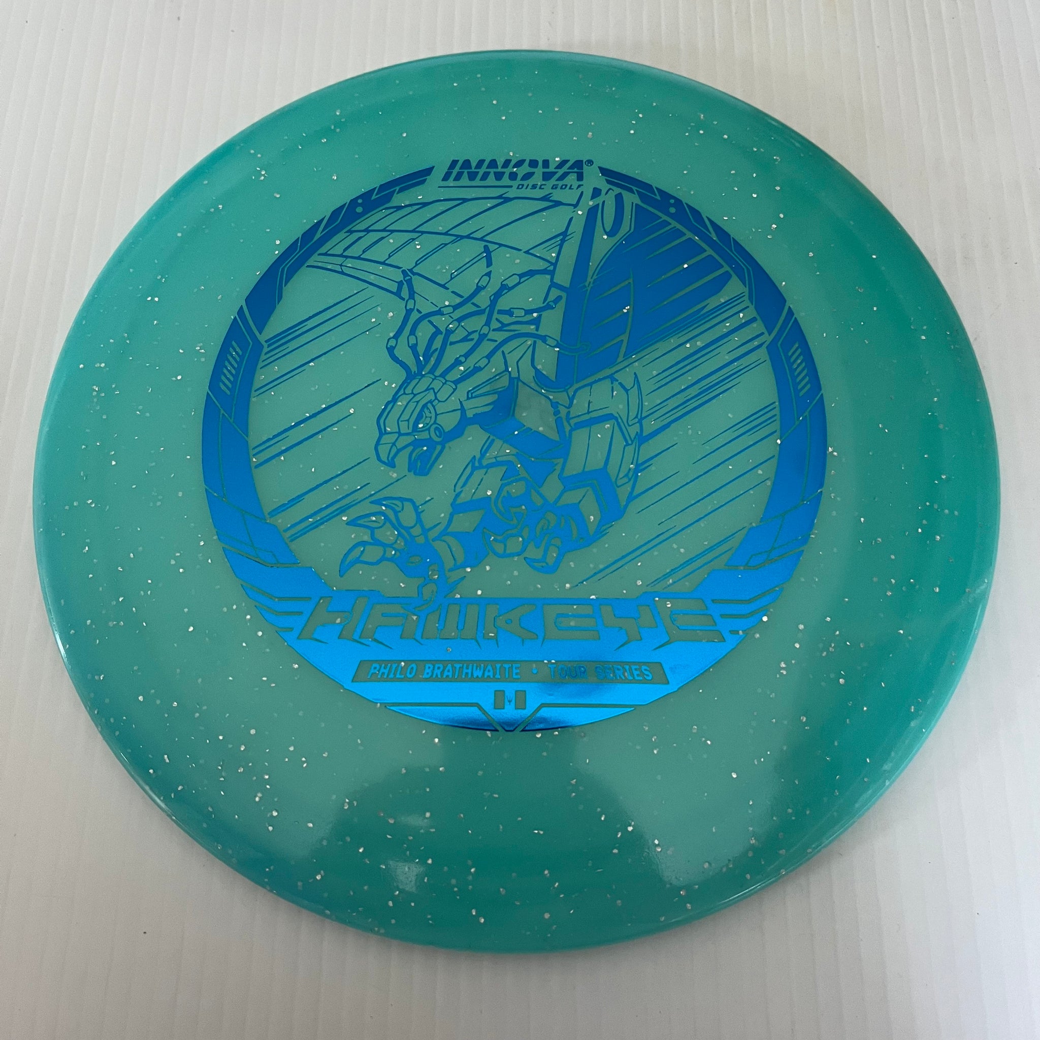 Innova 2023 Philo Brathwaite Tour Series Metal Flake Champion Glow Hawkeye 7/5/-1/1
