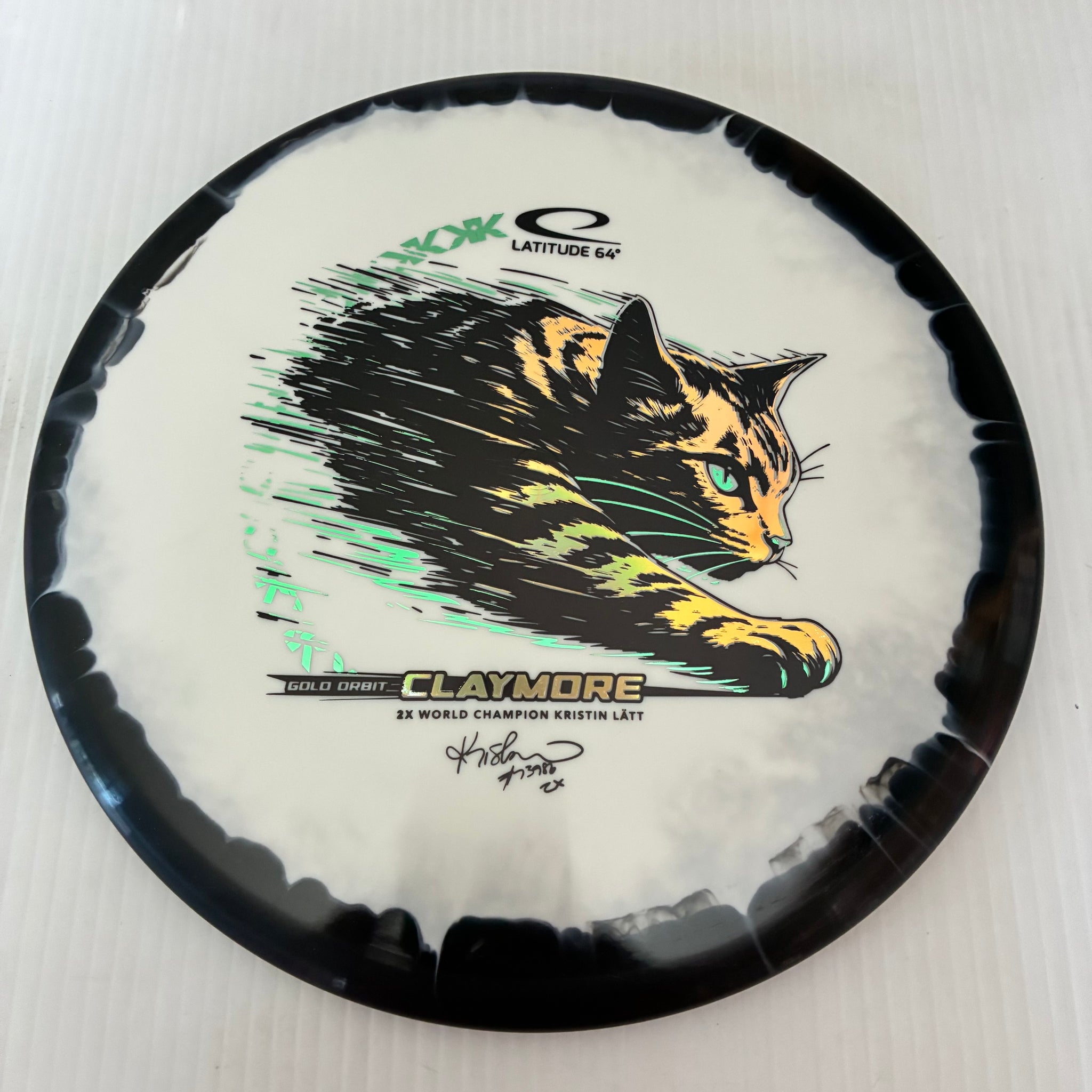 Latitude 64° 2026 Kristin Lätt Team Series Gold Orbit Claymore 5/5/-1/1