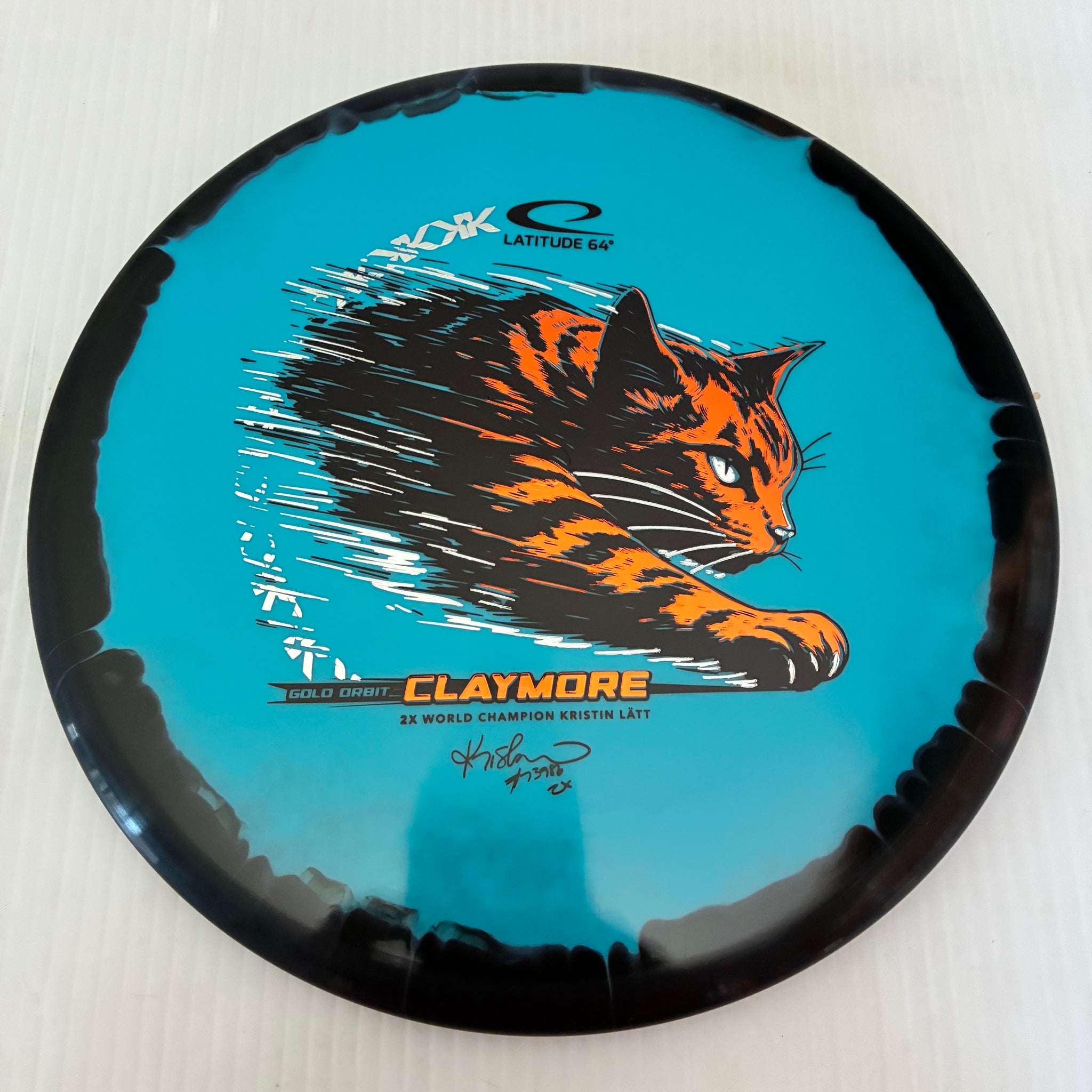 Latitude 64° 2026 Kristin Lätt Team Series Gold Orbit Claymore 5/5/-1/1