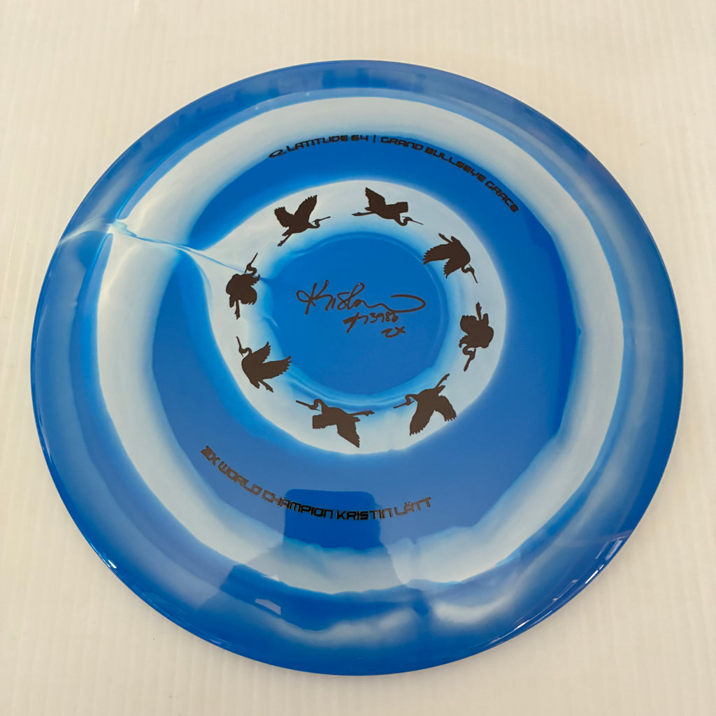 Latitude 64° 2025 Kristin Lätt Team Series Royal Grand Bullseye Grace 11/6/-1/2