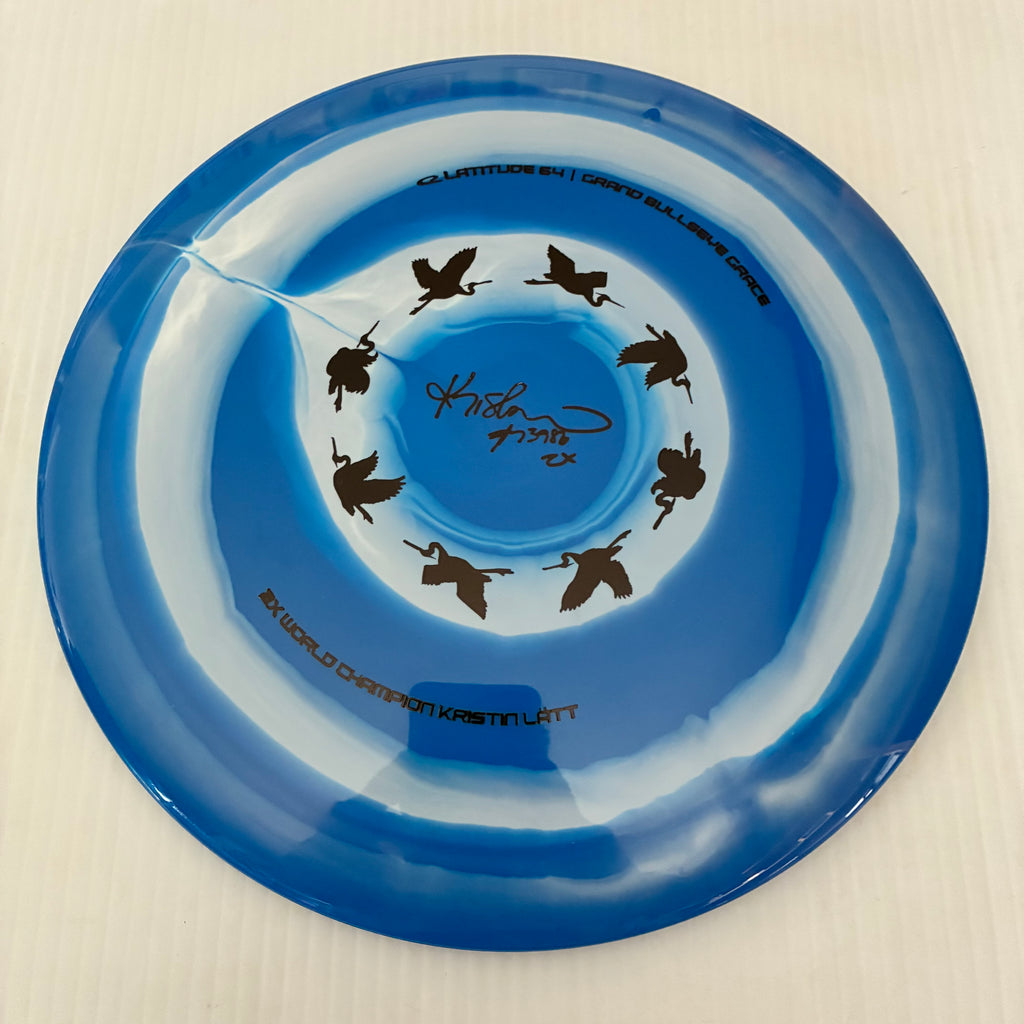 Latitude 64° 2025 Kristin Lätt Team Series Royal Grand Bullseye Grace 11/6/-1/2
