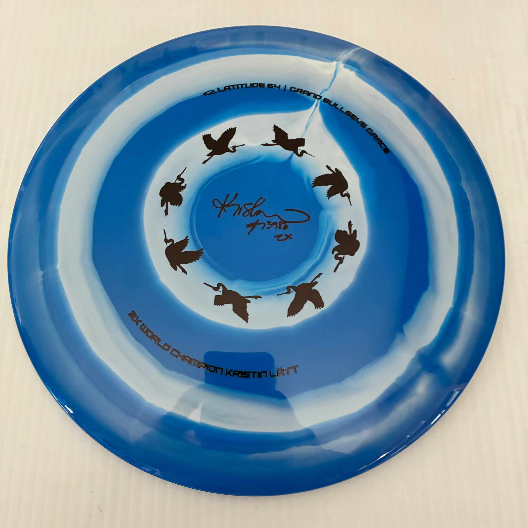 Latitude 64° 2025 Kristin Lätt Team Series Royal Grand Bullseye Grace 11/6/-1/2