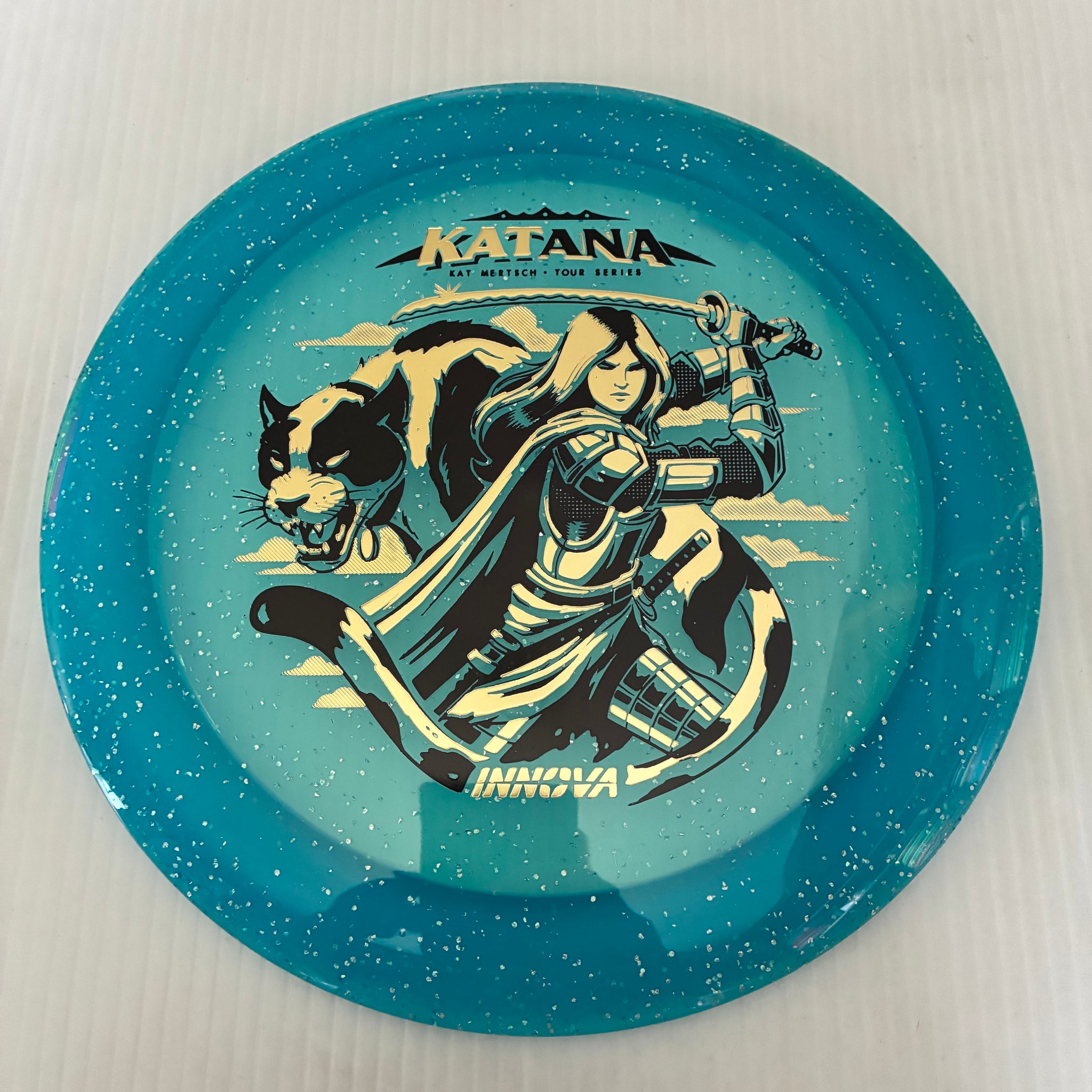 Innova 2026 Kat Mertsch Tour Series Metal Flake Champion Katana 13/5/-3/3