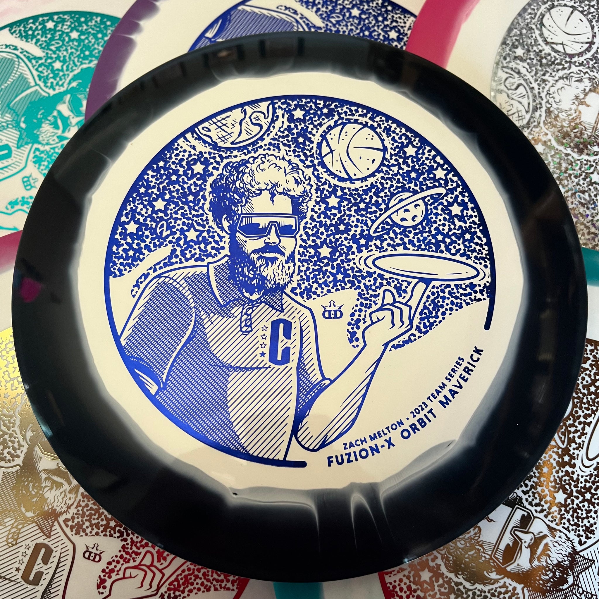 Dynamic Discs 2023 Zach Melton Team Series Fuzion-X Orbit Maverick 7/4/-1.5/2