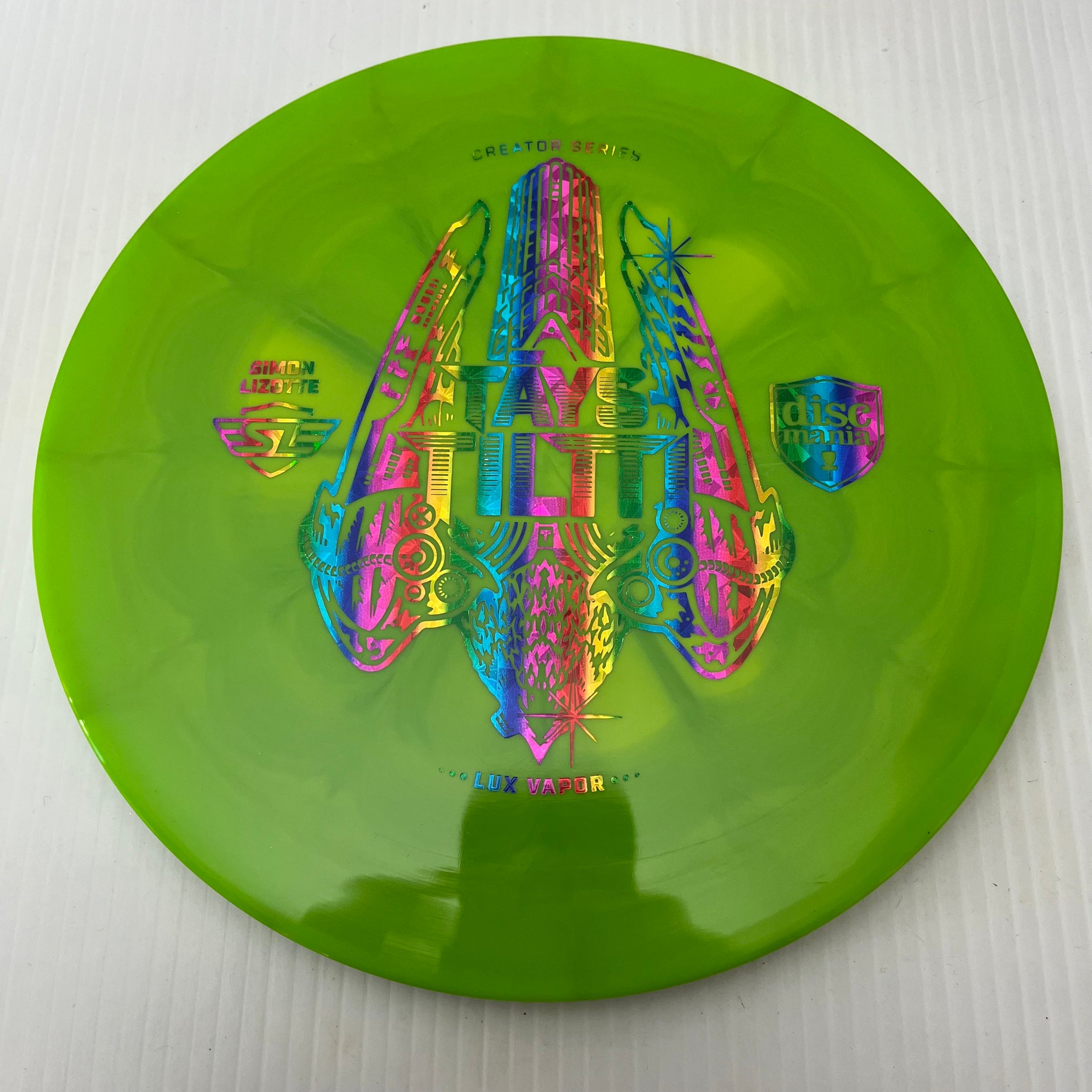 Discmania Full outlets Tilt Simon Lizotte Triumph series Lux vapor, Green, 176g